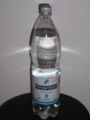 A PET bottle (containing mineral water)