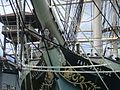 Photograph of the prow of Falls of Clyde, featuring the female figurehead beneath the bowsprit.