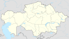 Mapa konturowa Kazachstanu, blisko centrum na prawo u góry znajduje się punkt z opisem „Astana Arena”