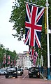 Image 17Union Flag being flown on The Mall, London looking towards Buckingham Palace (from Culture of the United Kingdom)