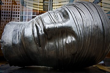 Testa Addormentata, bronze, 1983, located at Bank Street, outside West Wintergarden, Canary Wharf, London, Great Britain.