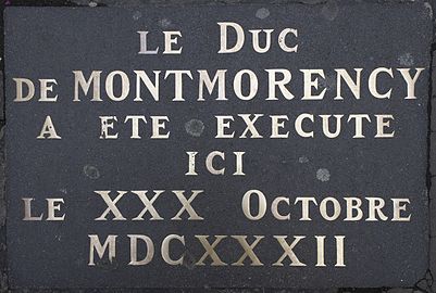 Dalle rappelant l'exécution de Henri II de Montmorency.