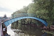 Pedestrian bridge from the west, looking downstream near DEFRA buildings 53°57′37″N 1°04′22″W﻿ / ﻿53.960272°N 1.072903°W﻿ / 53.960272; -1.072903