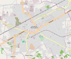 Mapa konturowa Grodziska Mazowieckiego, blisko centrum na lewo u góry znajduje się punkt z opisem „Pomnik Kolejarza w Grodzisku Mazowieckim”