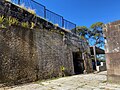 Gunners Barracks, tactically situated into the hillside so as not to be visible from the water. The barracks buildings were constructed from sandstone excavated onsite.