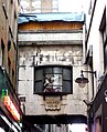 The Maurice House bridge across Walker's Court with carousel horse. (South side)