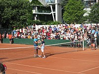 Adam Pavlásek et Diego Schwartzman à Roland-Garros en 2018.