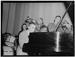 Hodes (left) on the piano with Pete Johnson.