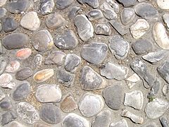 Tlak iz okroglih kamnov v Italiji