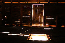 View from inside the winnowing barn at Mansfield Plantation. Note the hole in the floor where the unpurified grain was dropped