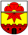 Gemeinde Alverdissen gültig bis 31. Dezember 1968 Genehmigung durch den Innenminister des Landes Nordrhein-Westfalen am 9. Juli 1958. „In Gold eine rote Zinnenmauer mit zwei kleinen schwarzen Rundbogenfenstern und einem schwarzen geschlossenen Tor; darüber ein halber roter achtstrahliger Stern, über dem sich in silbernem Schildhaupt eine halbe lippische Rose befindet.“