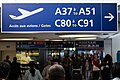 Signalétique de l'aéroport Roissy-Charles-de-Gaulle, dans la fonte Frutiger.