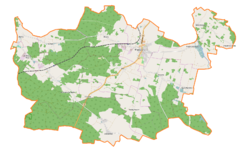 Mapa konturowa gminy Międzybórz, blisko centrum po lewej na dole znajduje się punkt z opisem „Węgrowa”