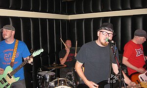 Left to right: Eli Caterer, Neil Hennessy, Josh Caterer, and Matt Caterer in 2012