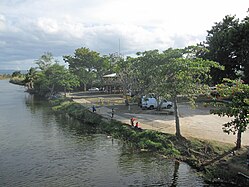 View of river from bridge on Calle Méndez Vigo in Dorado