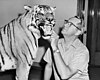 Wilmer W. Tanner with taxidermied tiger specimen