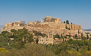 Acropolis of Athens, a noted polis of Classical Greece. The polis was the whole city, which had its own walls. Shown is a part of the polis, the akro-polis, "city heights," which was never alone regarded as its own city. The origins of the settlement are lost in prehistoric times. Also included in the classical Athenian polis were suburban locations in the region of Attica, such as the port, Piraeus.