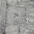 A medieval mass dial (minus its gnomon) at St. Mary, Bibury; also known as a scratch dial, it was used to tell the times of Mass.