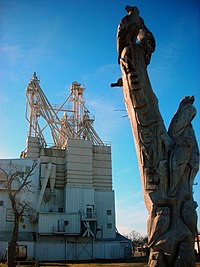 A wood carving and feed mill in Muenster