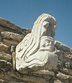 Image 21Ballcourt marker from the Postclassic site of Mixco Viejo in Guatemala. This sculpture depicts Kukulkan, jaws agape, with the head of a human warrior emerging from his maw. (from Snake)