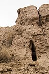 Arrow-shaped arrowslit and merlons, walls of Guldursun-Kala