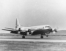 Image of a Lockheed L-188 Electra aircraft landing