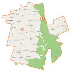 Mapa konturowa gminy Janów, blisko centrum na lewo znajduje się punkt z opisem „Janów��