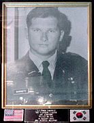 Foto de retrato de Lt. Mark Barrett.