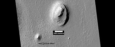 Buttes, as seen by HiRISE under HiWish program. Buttes have layered rocks with a hard resistant cap rock on the top which protects the underlying rocks from erosion.