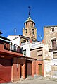 Vista parcial de Tormón (Teruel) desde la Plaza, con la torre-campanario de la parroquial al fondo (2017).