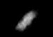 Naiad vue par Voyager 2. L'image est tachée en raison de la combinaison d'une longue exposition nécessaire à cette distance du Soleil et du mouvement relatif rapide de la lune et de Voyager.