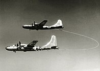 Looped hose refuelling during round-the-world flight.