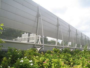 This noise abatement wall in the Netherlands has a transparent section at the driver's eye-level to reduce the visual impact for road users.