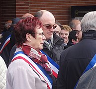 Arlette Dupilet (de profil) lors de la manifestation contre la suppression des dessertes TGV en gare de Douai du 2 mars 2019.