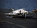 A VMFA-531 F-4N landing on the USS Coral Sea in 1980