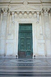 One of the massive neoclassical doors