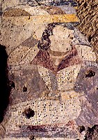 Devotee in double-lapel caftan, left wall of the niche of the Western Buddha.[41][42] He has also been described as a Hephthalite.[43]