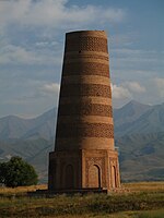 A brick minaret with missing top