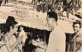 A bride is greeting guests