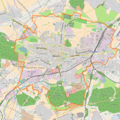 Mapa konturowa Drohobycza, w centrum znajduje się punkt z opisem „Państwowe Liceum i Gimnazjum im. Króla Władysława Jagiełły w Drohobyczu”