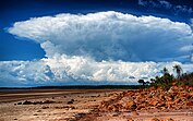 Anvil clouds rising over a thunderstorm