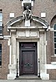 Figure of Joseph Priestley by Gilbert Bayes above the doorway of the former Royal Institute of Chemistry