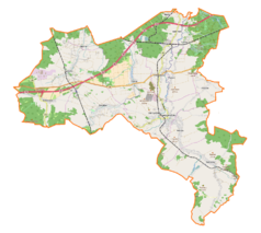 Mapa konturowa gminy Nowogrodziec, po lewej nieco u góry znajduje się punkt z opisem „Pałac w Wykrotach”