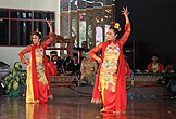 Jaipongan, a traditional dance from West Java, known for its lively, rhythmic movements and vibrant music. It blends elements of Sundanese dance and music.