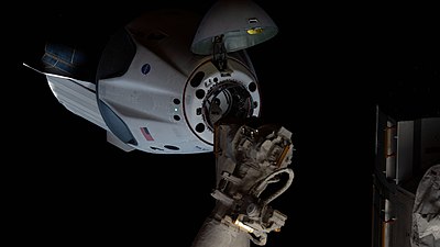 Crew Dragon Endeavour approaching the International Space Station with open nosecone in preparation for docking.