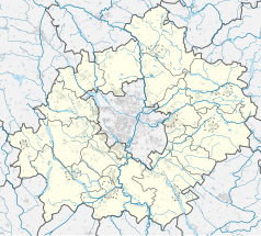 Mapa konturowa powiatu poznańskiego, na dole znajduje się punkt z opisem „Puszczykowo”