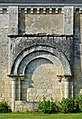 Former side portal of the church (12th-15th centuries) in Savigné