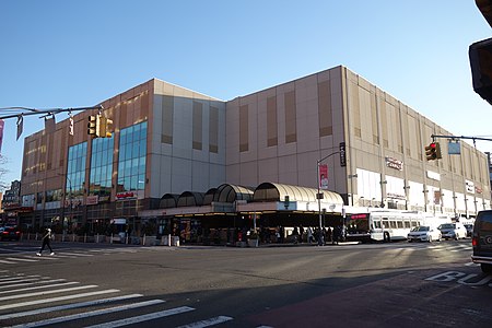 The main entrance, located at the northeast corner of Archer Avenue and Parsons Boulevard