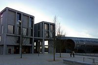 Square, modern building in winter