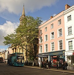 Busy urban street with storefronts